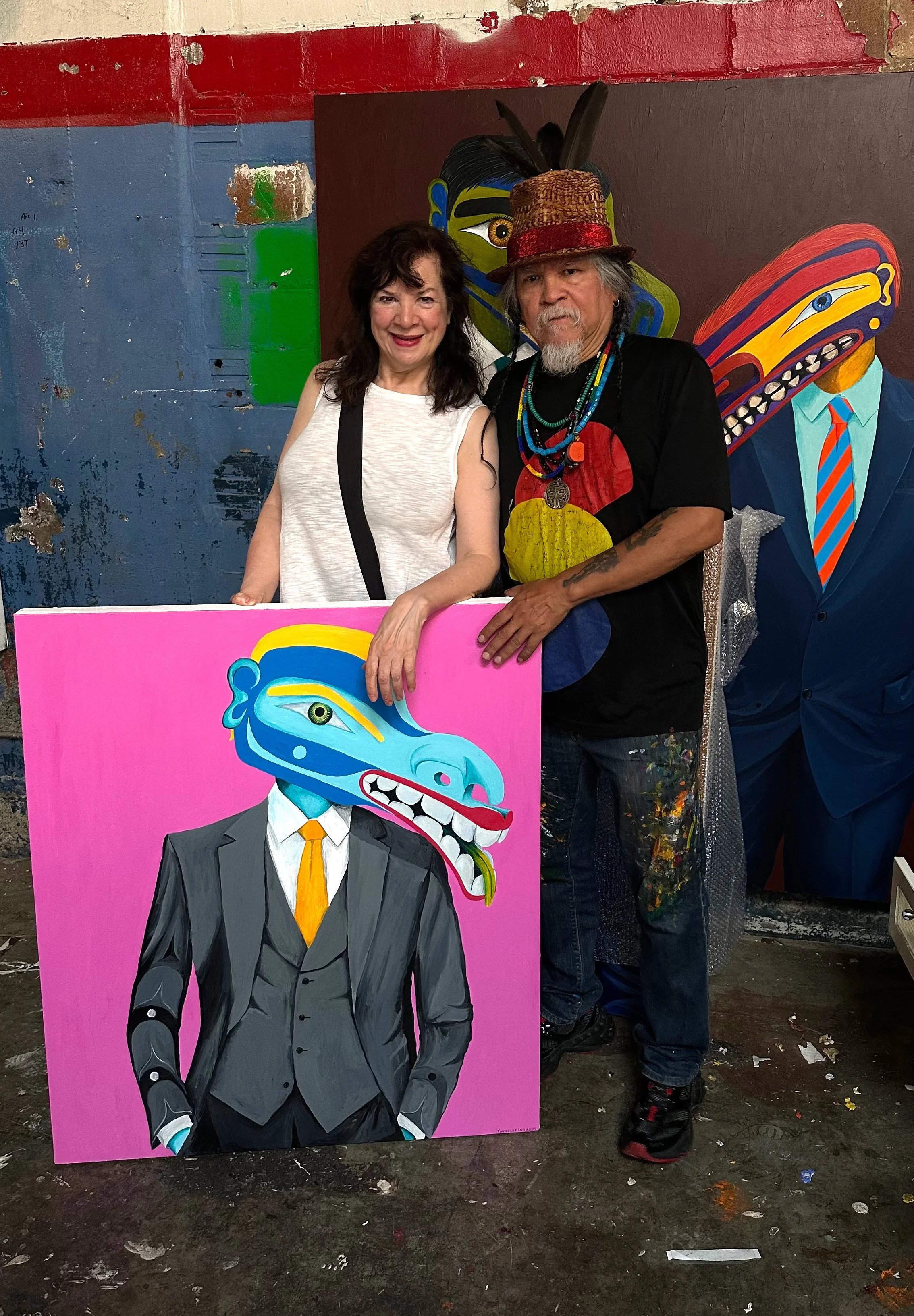 Angela Grossmann and Lawrence Paul Yuxweluptun in his studio.