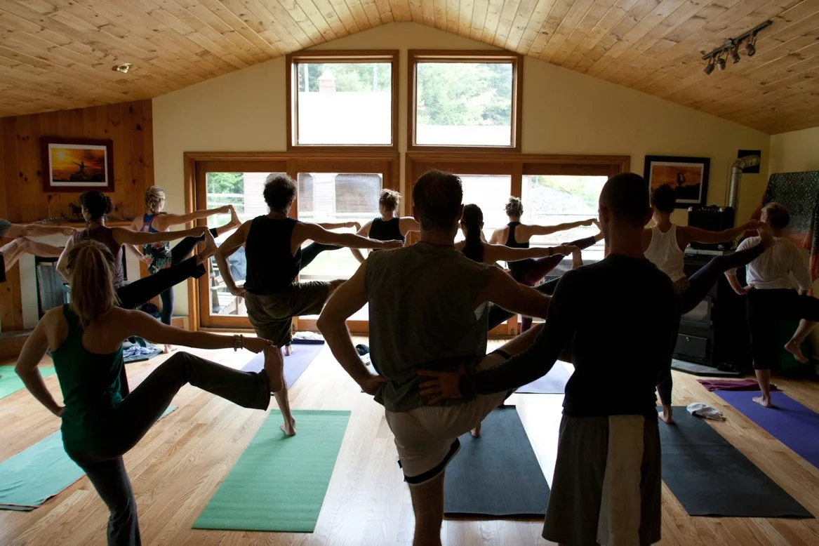 A group shot of Utthita Parshvasahita from an Ashtanga practice led by the amazing Kathy McNames and Scott York from Yoga Vermont. This was part of an overnight retreat at the Stowe Mountain Ranch Yoga Retrat Center back in September of 2012. Spot me in the front row! One of my favorite Vermont memories. 