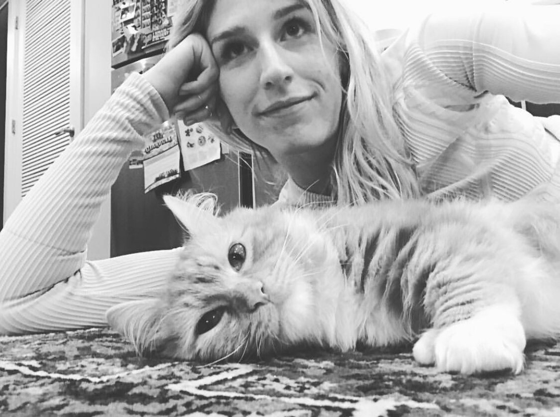 Lillian and her beloved foster cat, Tripod.