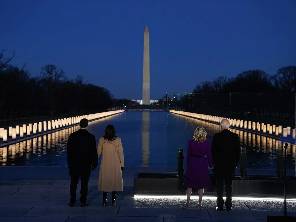 The president and vice president and memorialize victims of the COVID-19 pandemic on January 19, 2021  | SOURCE: NPR
