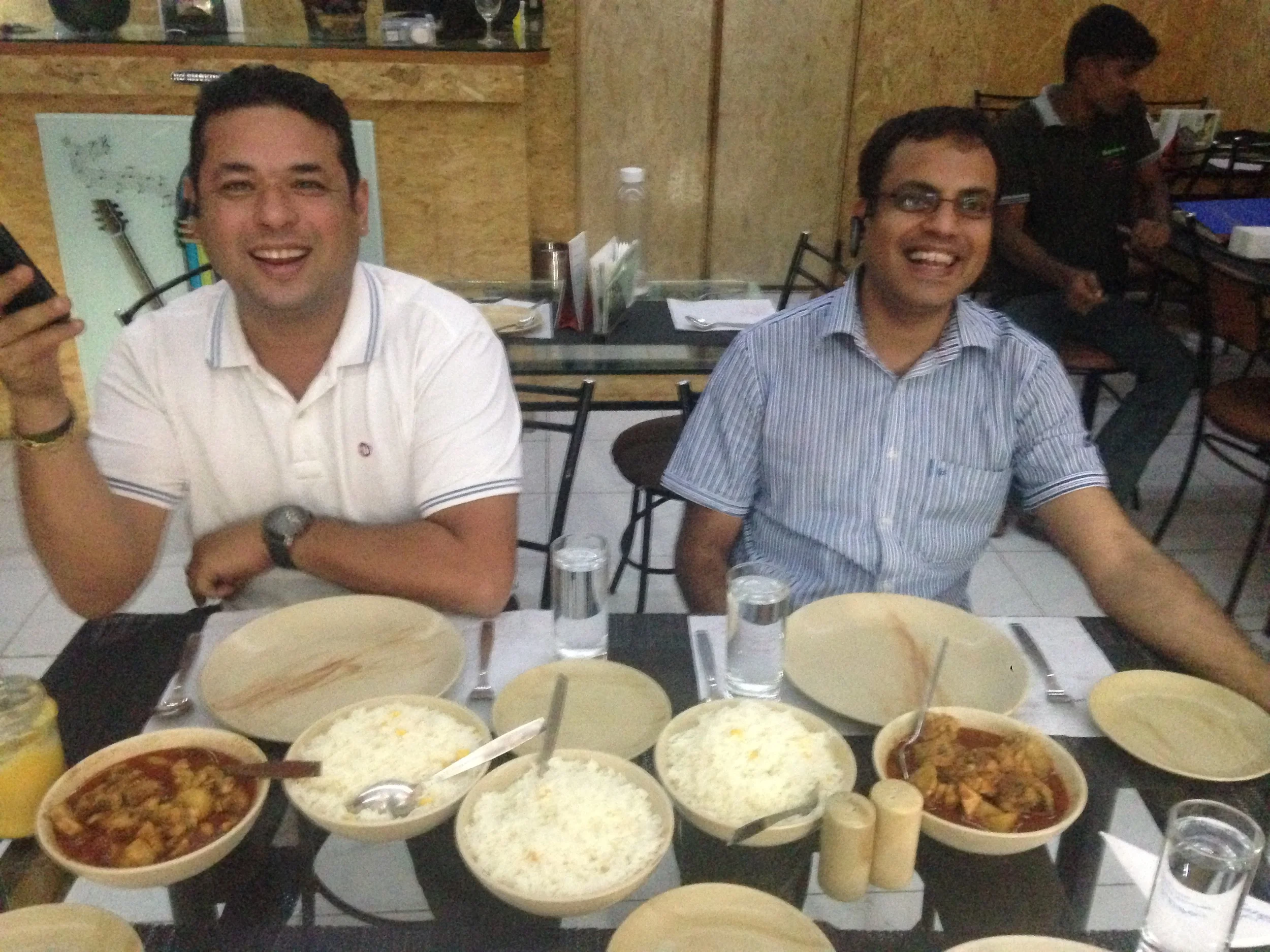 Dom and Eric about to eat some delicious chicken curry.