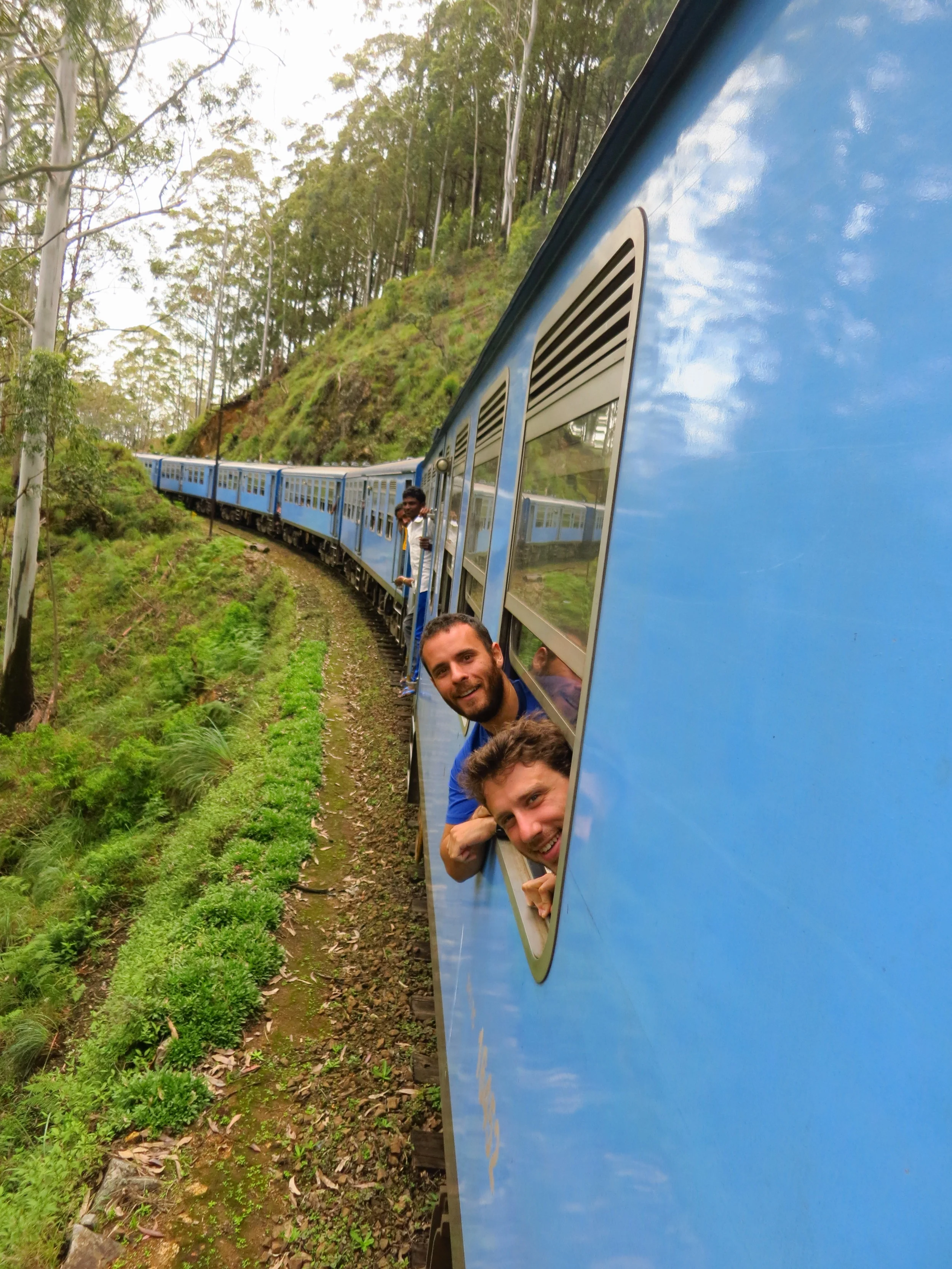 Sam and I poking our heads out of the window of the train through the countryside.