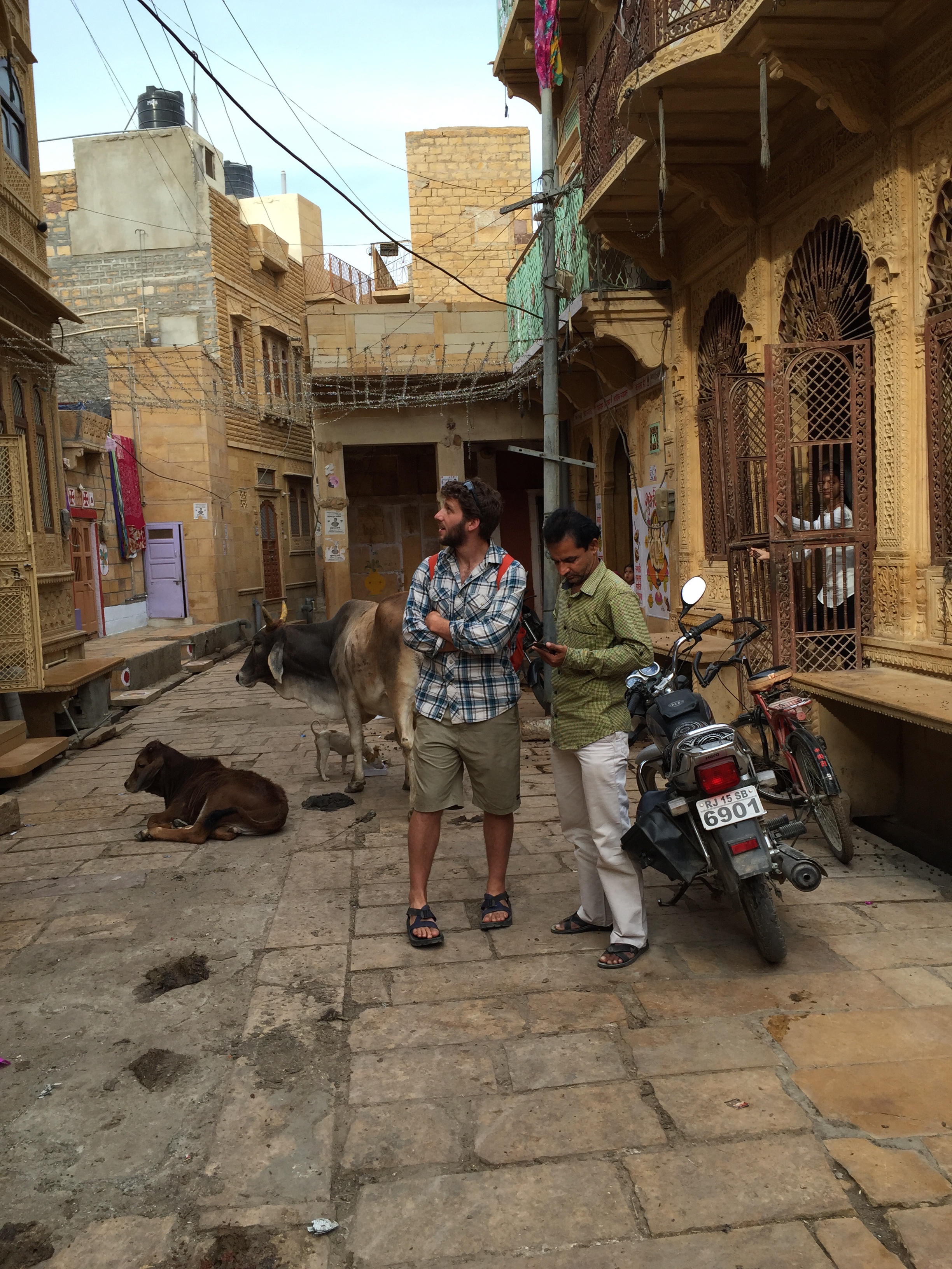 With the jeweler outside of his home.