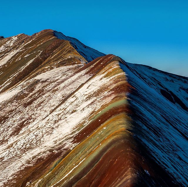 Rainbow Mountain up close after a snow flurry and from a distance in the afternoon. #peru #cusco #5000meters #rainbowmountain #photography #landscapephotography #landscape #travel #travelledworld #travelphotography #backpacking #hiking #ausungate #op