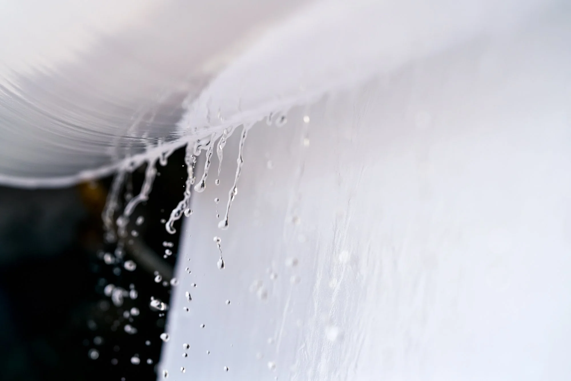  Detail of fabric being washed during finishing process at textile factory. 