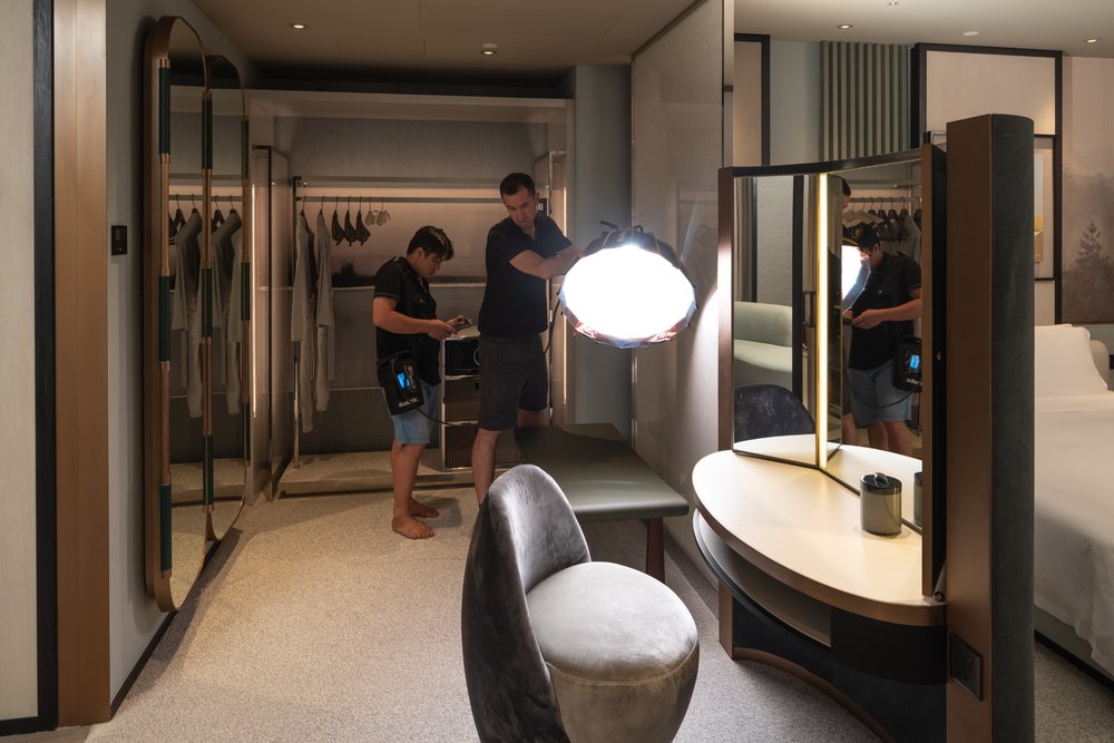  Behind the scenes as photographer Tim Gerard Barker light paints while capturing interior images at New World Hoiana Beach Resort. 