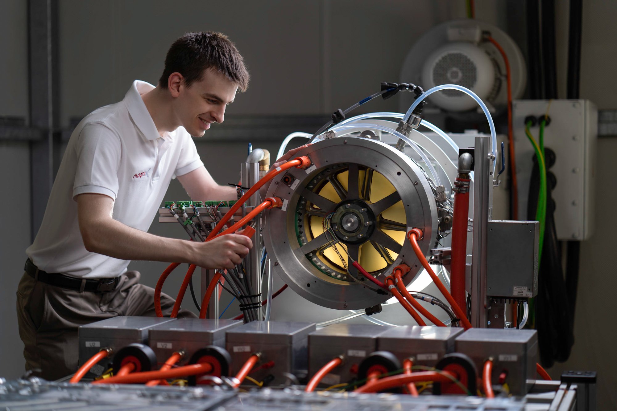  A magniX engineer testing an electric propulsion unit. 