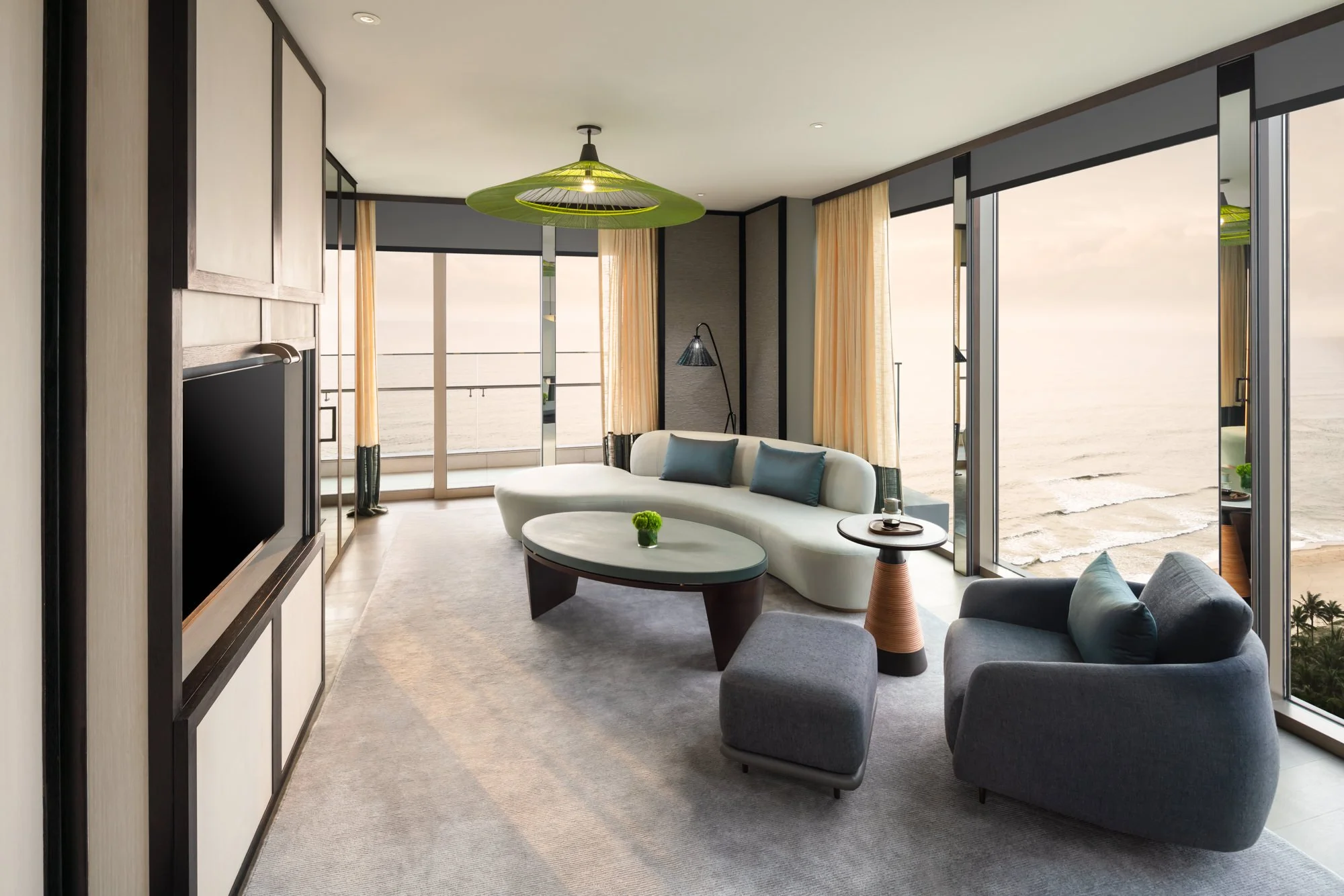  Interior view of the Premier Ocean Suite living room at the New World Hoiana Beach Resort. 