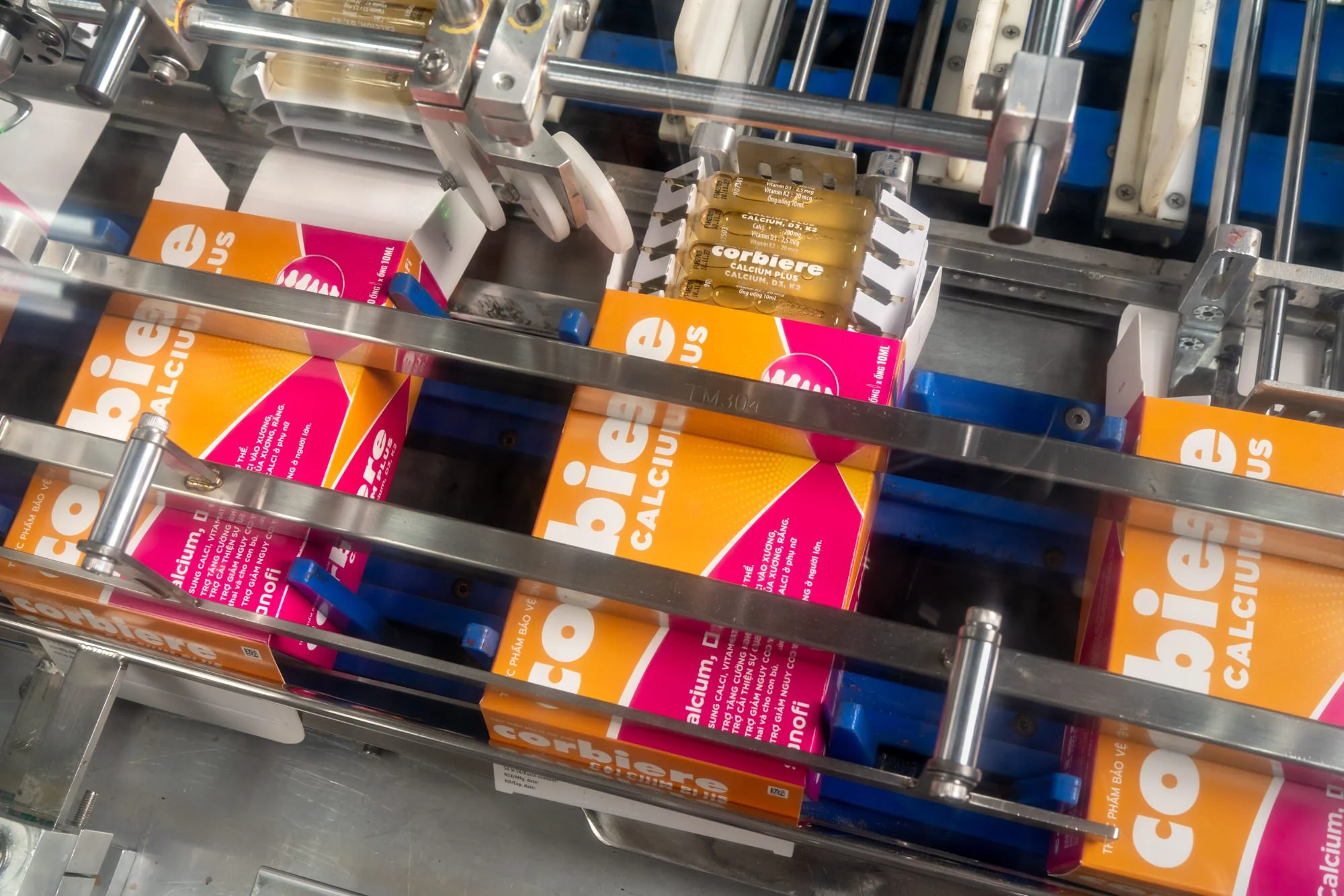  Automated production line packs tubes of Corbiere Calcium Plus into boxes at the Opella manufacturing facility in Ho Chi Minh City, Vietnam. 
