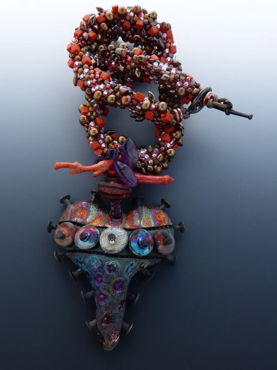 Crocheted Glass, coral, Pearls, and Amethyst.