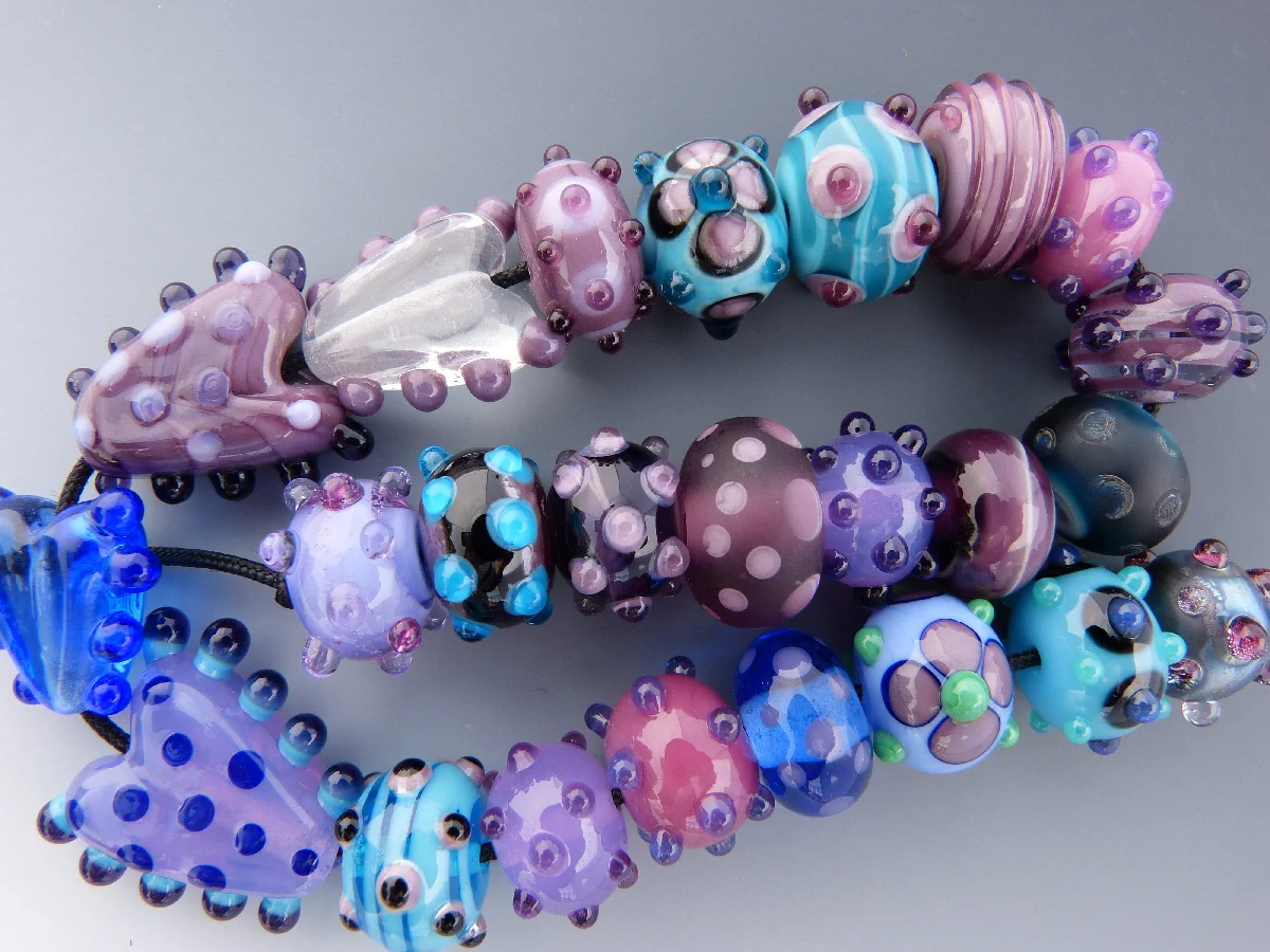 Strand of Assorted Purple and Blue Lampwork Glass Beads