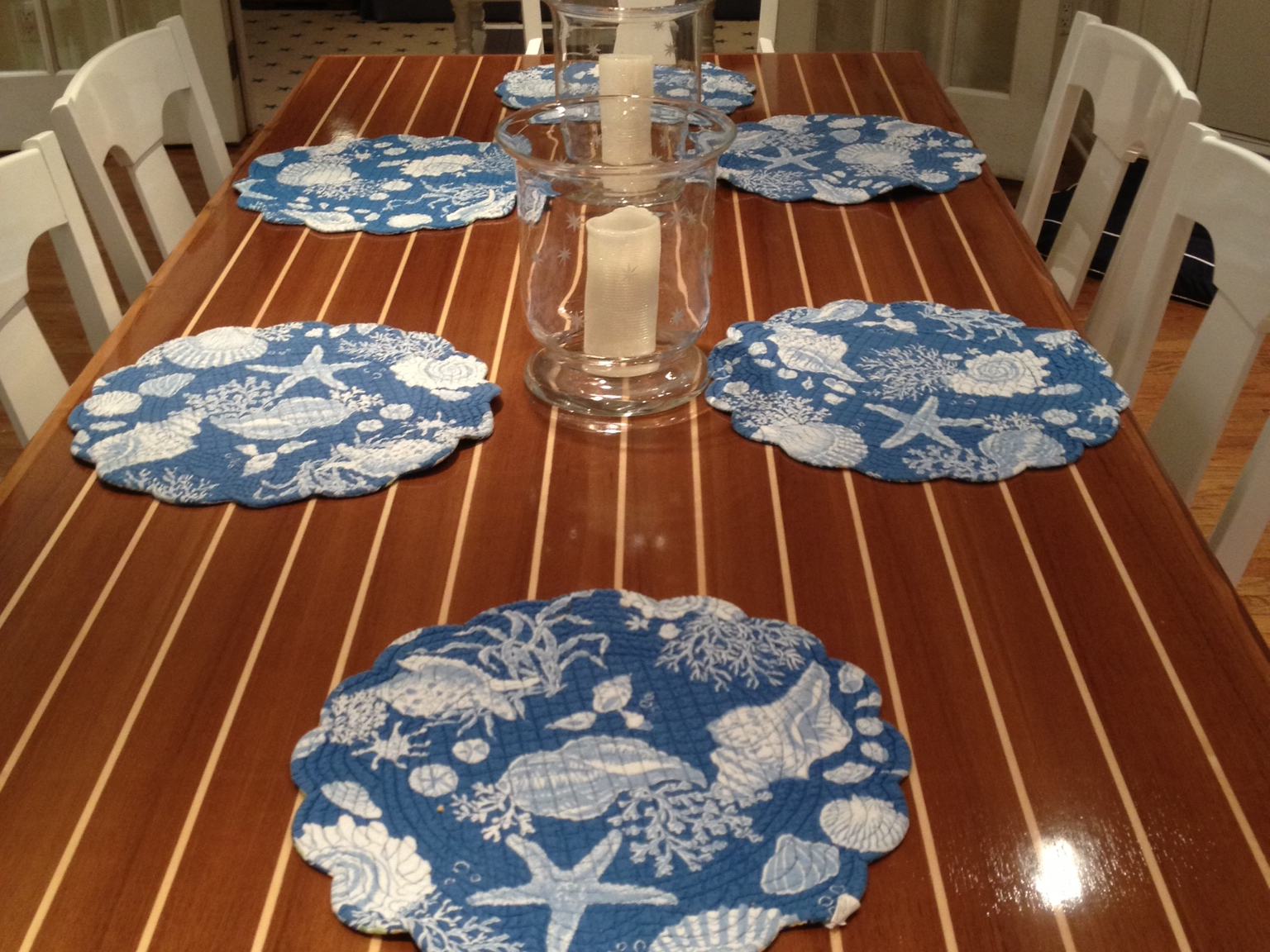 Dory table set with placemats and candles