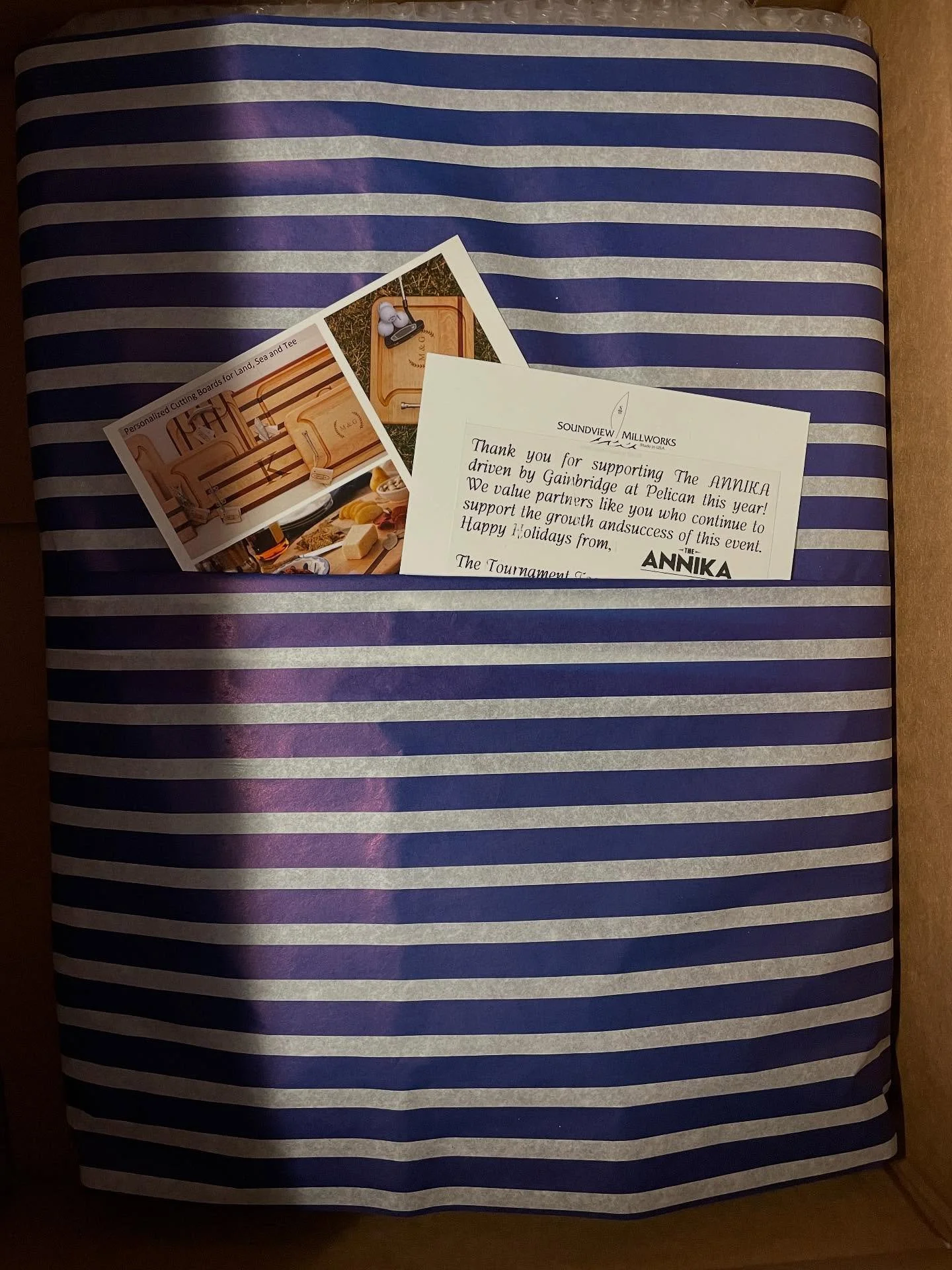 Ever wonder how your gift is sent?  Each board is individually wrapped in paper, bubble wrap and the signature navy and white tissue paper with notes tucked in and taped in place so it's the first thing the recipient sees! 
  We know these gifts mean