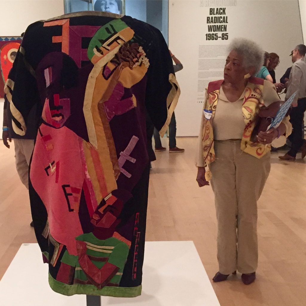 Jae_Jarrell_examining_her_work_at_the_Brooklyn_Museum-1024x1024.jpg