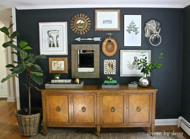 This is a great example of mixing objects and framed prints. Keeping the color palette in check and maintaining an appropriate spacing between items keeps this gallery from becoming a disjointed mess.