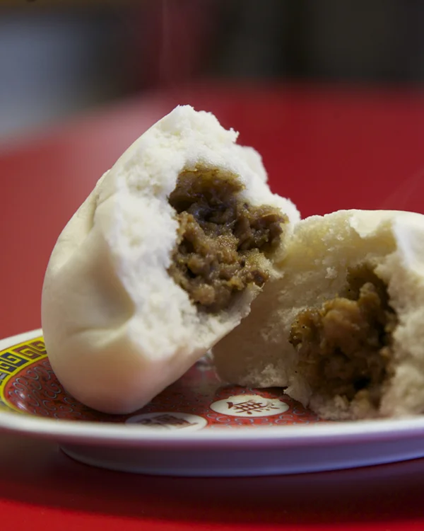 Banh Baosteamed bun with bbq pork stuffing | $3.50