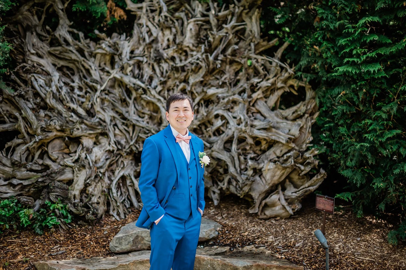 Groom portrait at the root cluster, a signature PNW photo spot at Willows Lodge, Woodinville WA