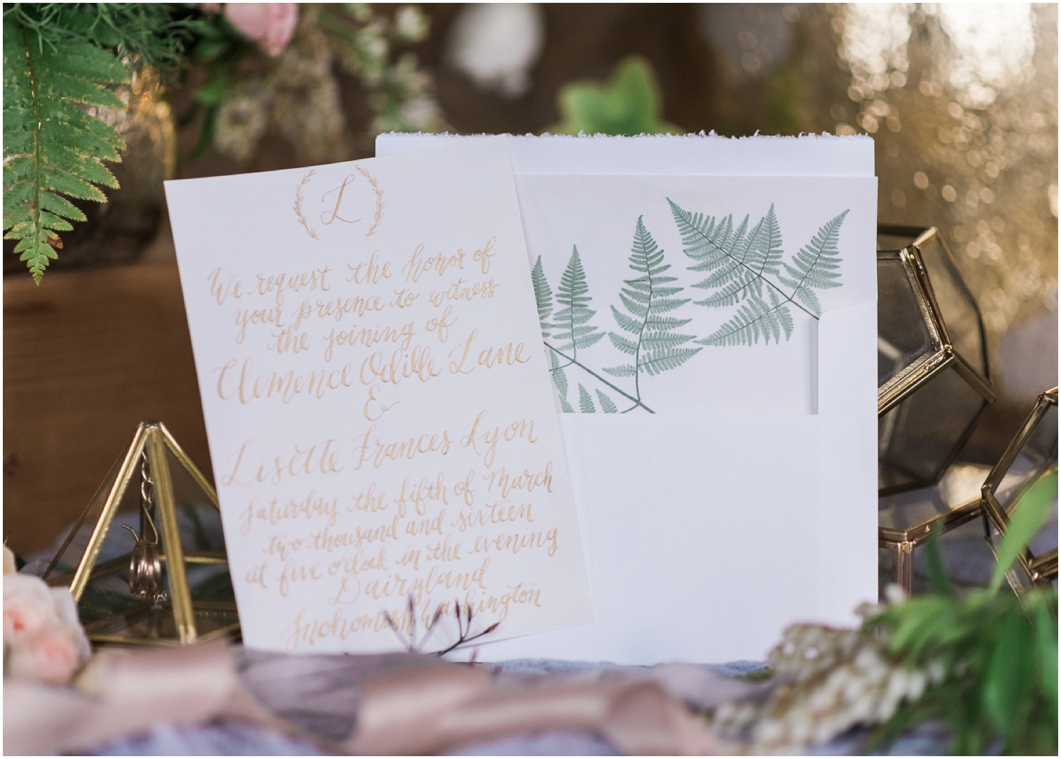 Dairyland french rustic lesbian 2 brides wedding. Romantic. Feminine. Calligraphy. Ferns. Candlelight