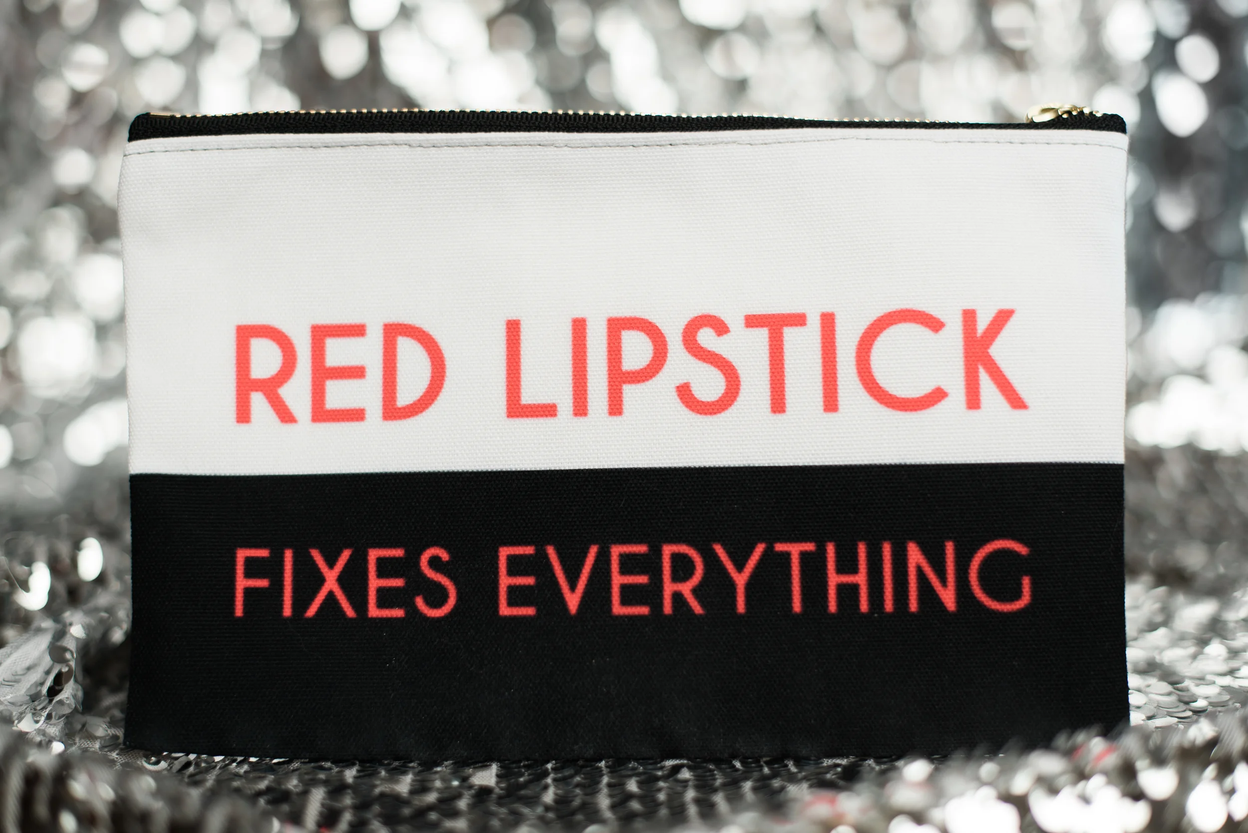 "Red Lipstick fiex Everything" makeup bag from Fifth & Ivy