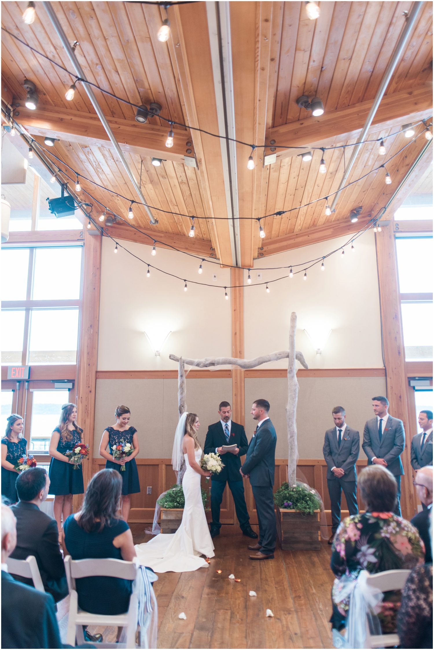 Chris & Laurens Nautical Port Townsend Wedding. Fall.  Old vintage Wooden Boats. Driftwood. Sand. Pre-Ceremony cocktails. Chalkboard Signs. 