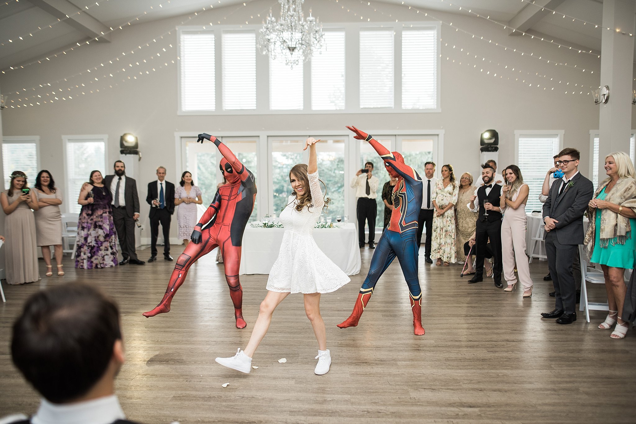 A surprise dance for the groom -- The Bride & two groomsmen dres