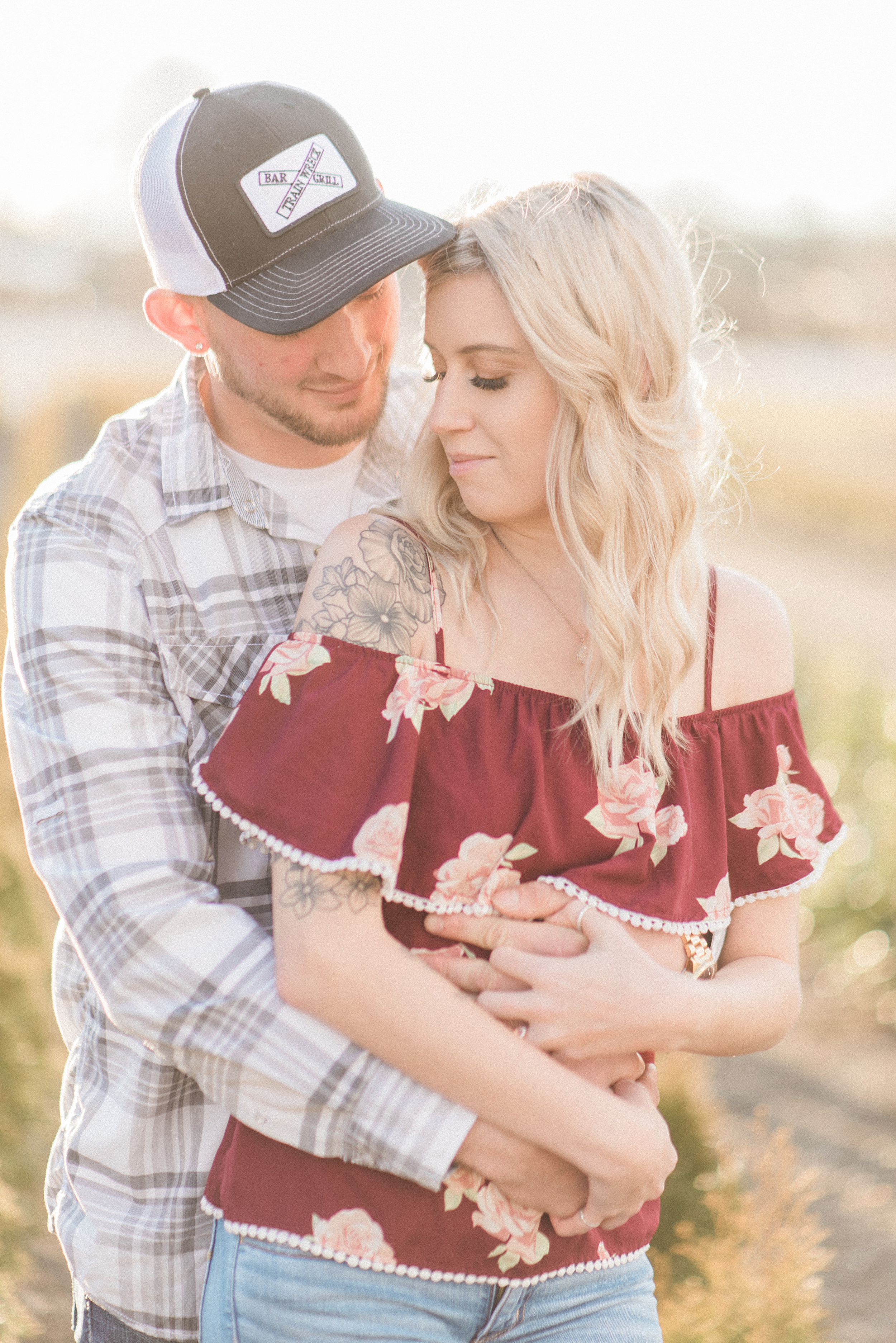 Snohomish Greenhouse nursery engagement session. Sunset. Seahawk