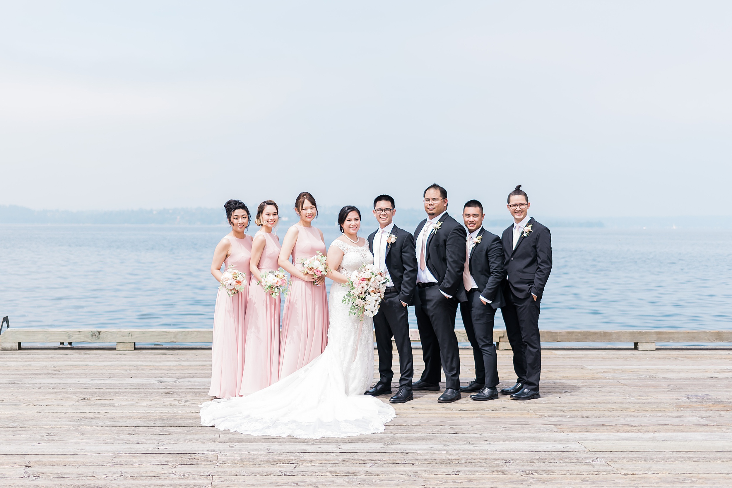 Creative bridal party posing photos. Woodmark Hotel Waterfront W