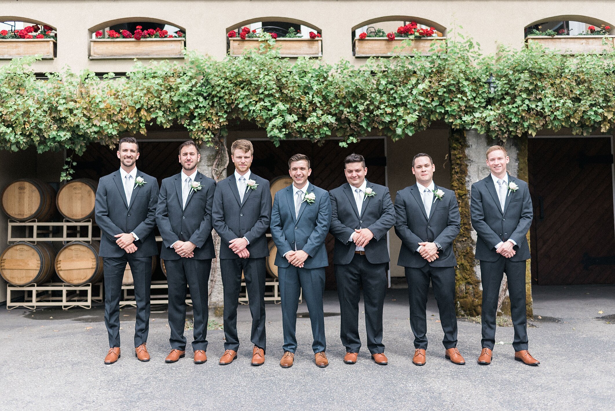 Groom and groomsmen in front of Chateau Lill in woodinville