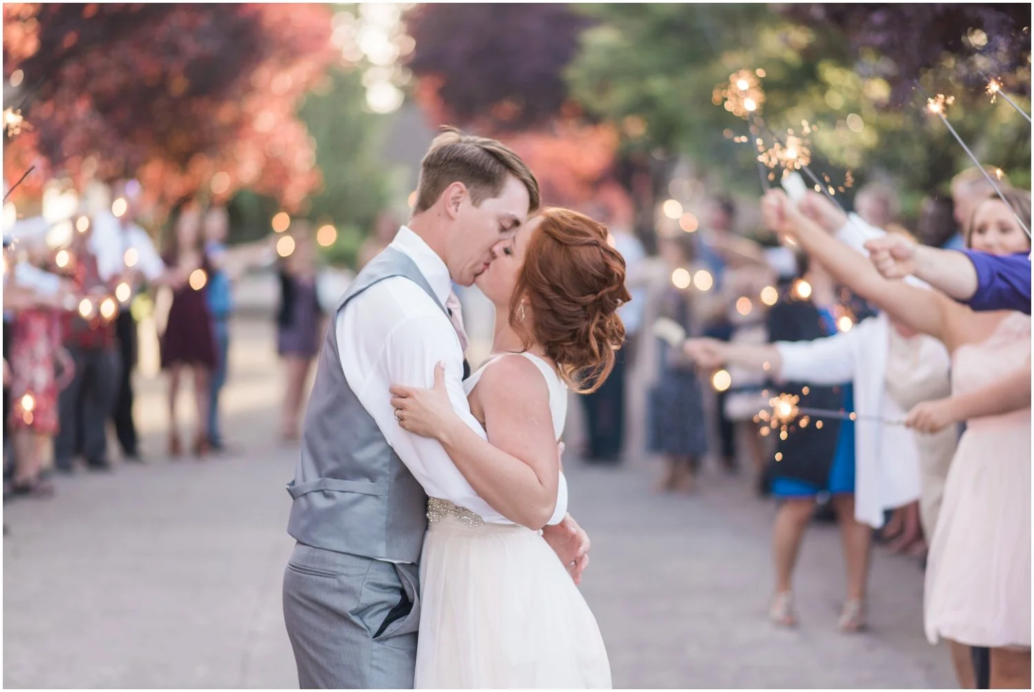 Bride and groom kissing during a sparkler send-off at Lord Hill Farms in Snohomish