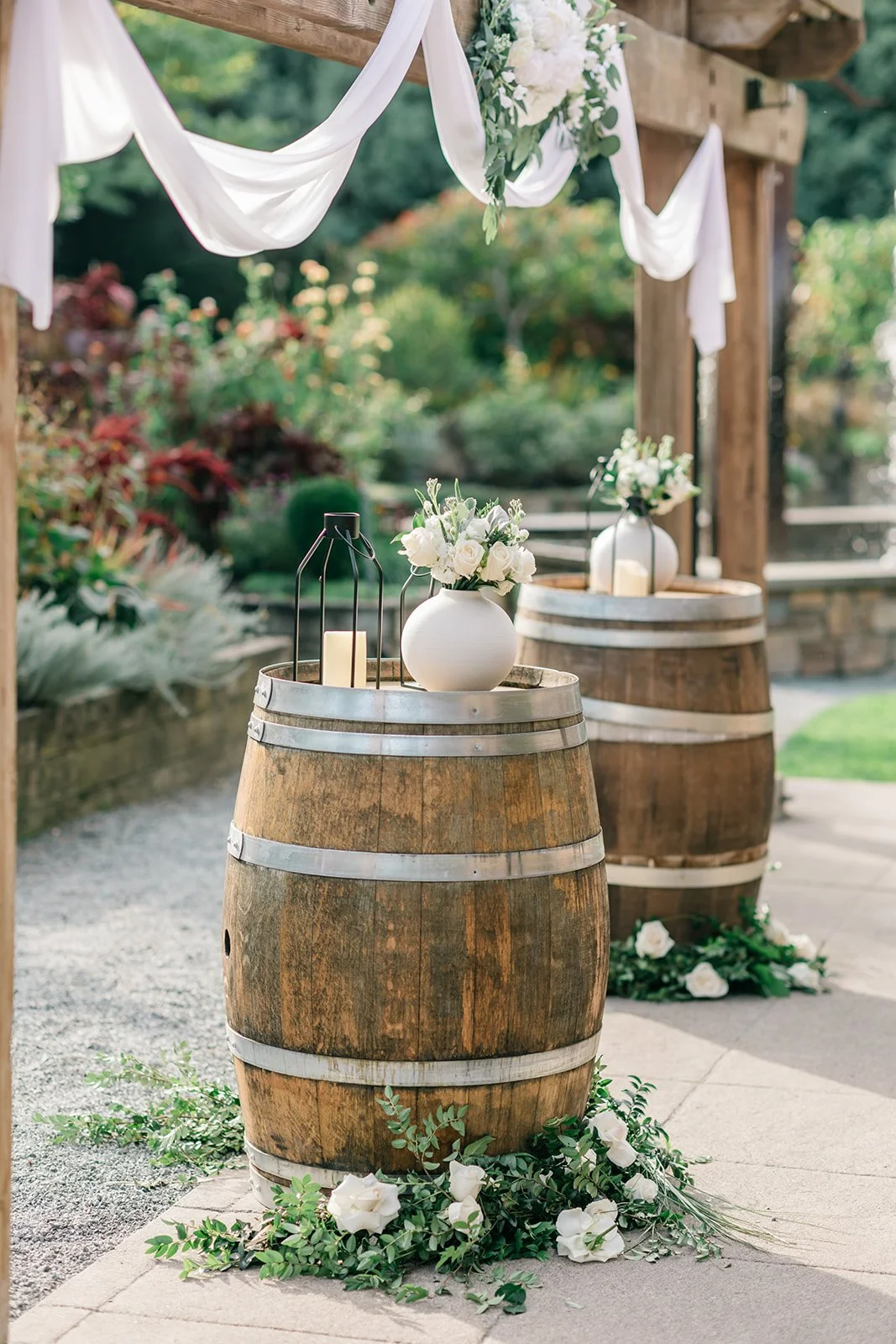 stephanie-jordan-willows-lodge-ceremony-wine-barrel-florals.jpg