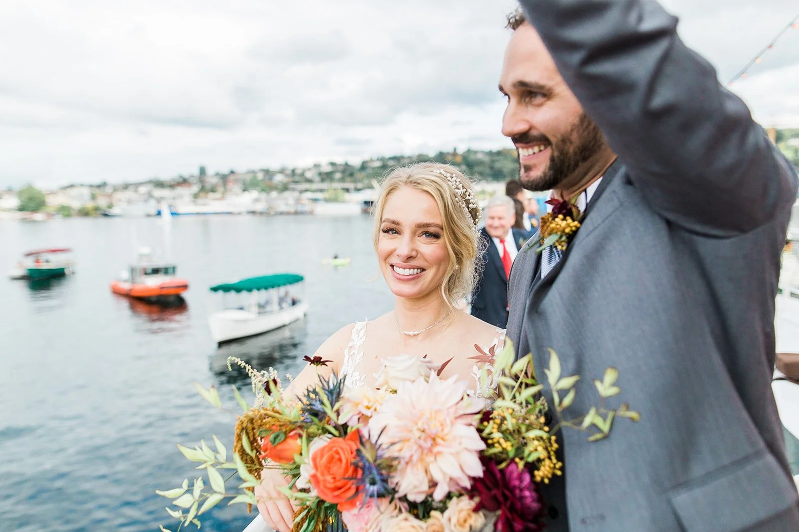 Couple celebrating with a colorful bouquet on Lake Union, MV Fremont