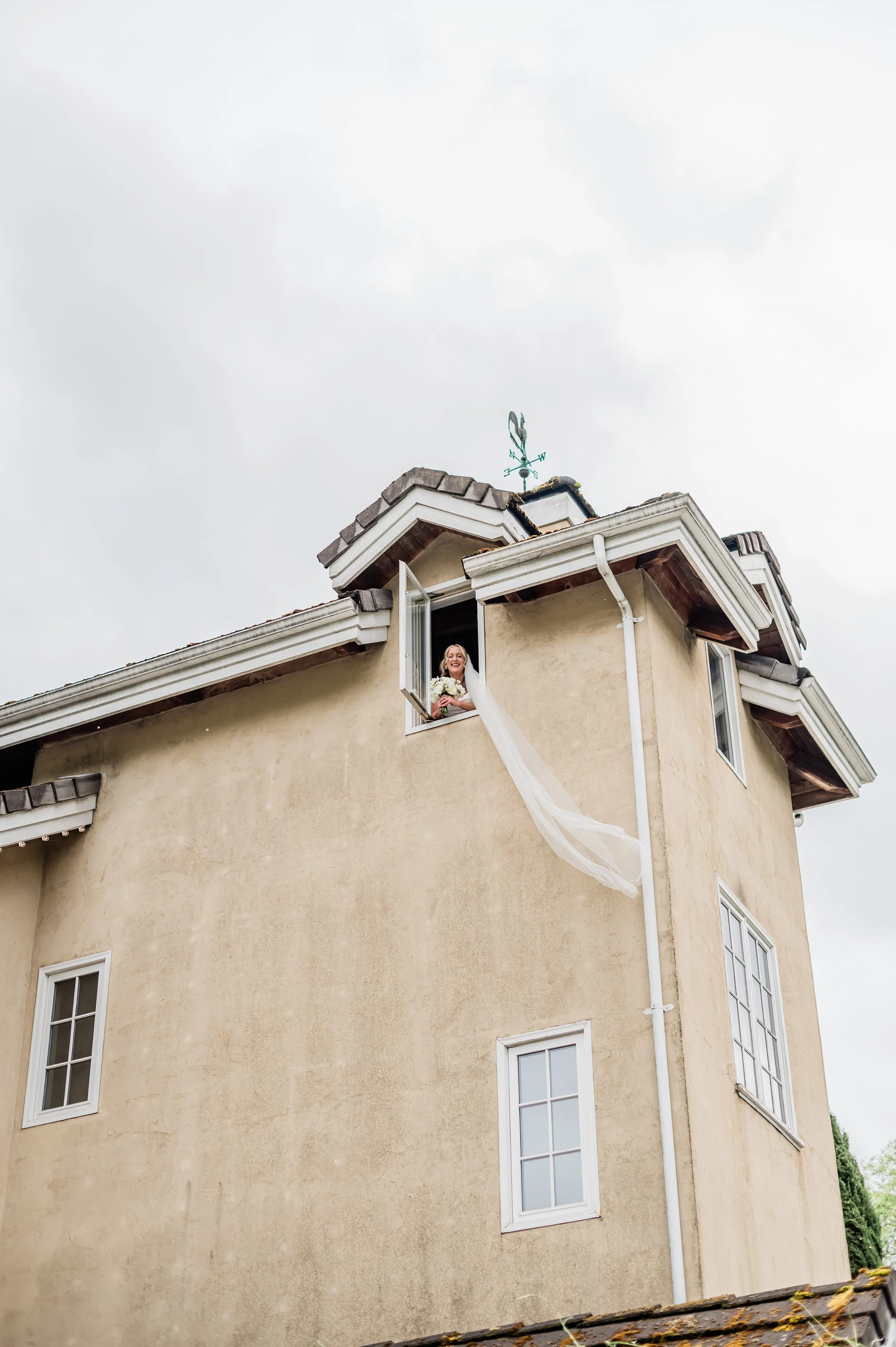 Tower at Chateau Lill with brides veil blowing in breeze
