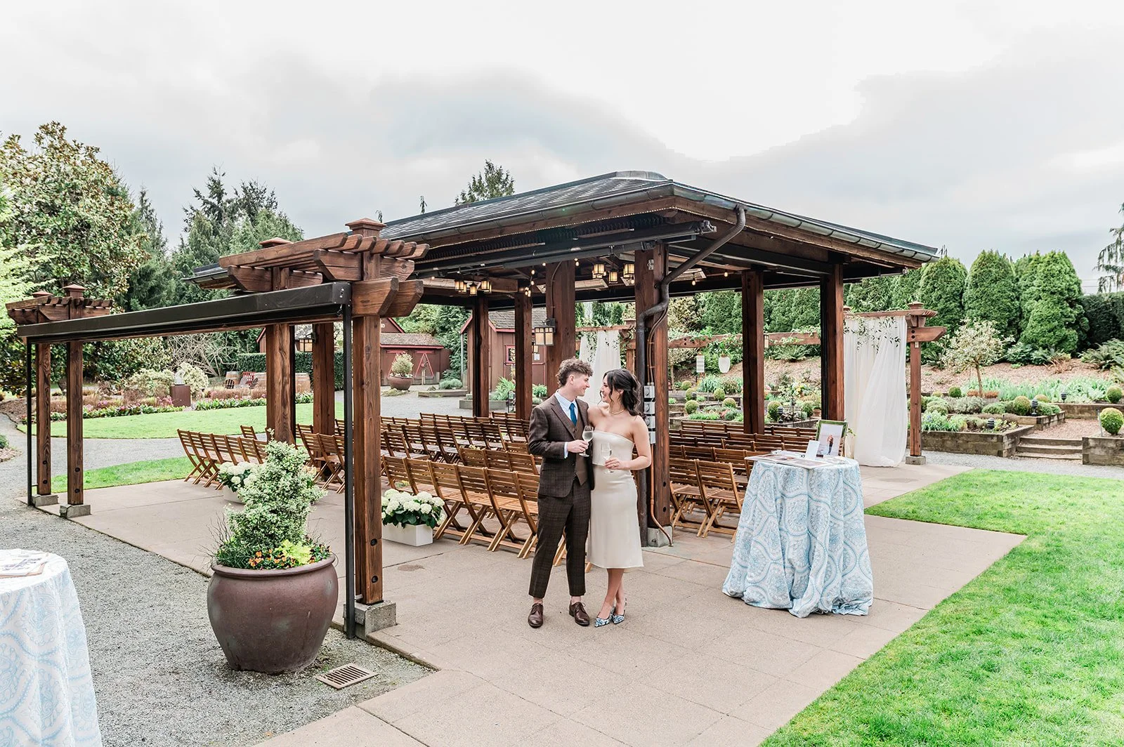 Couple standing at the Garden Gazebo ceremony space at Willows Lodge, Woodinville WA