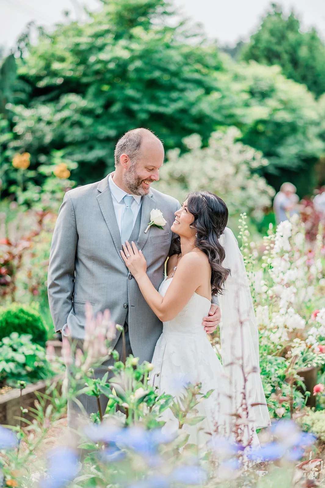 Couple portrait in the raised bed garden at Willows Lodge, Woodinville WA
