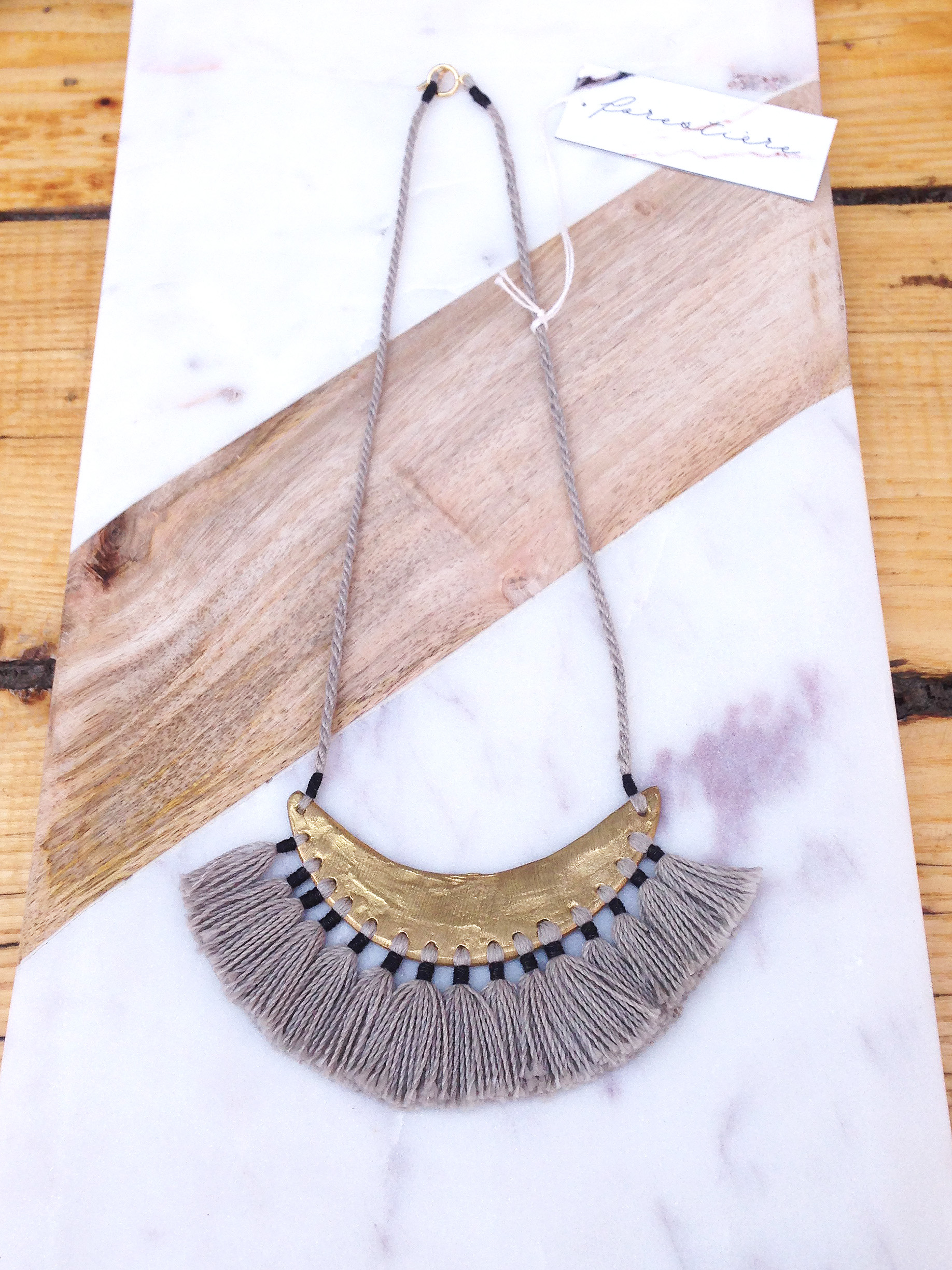 FORESTIERE fringe collar display at INLAND Spring 2015 copy.jpg