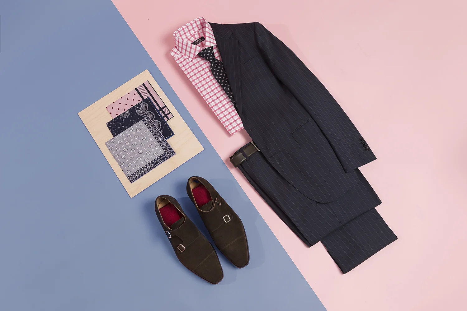 Navy pin stripe suit and pocket squares.jpg