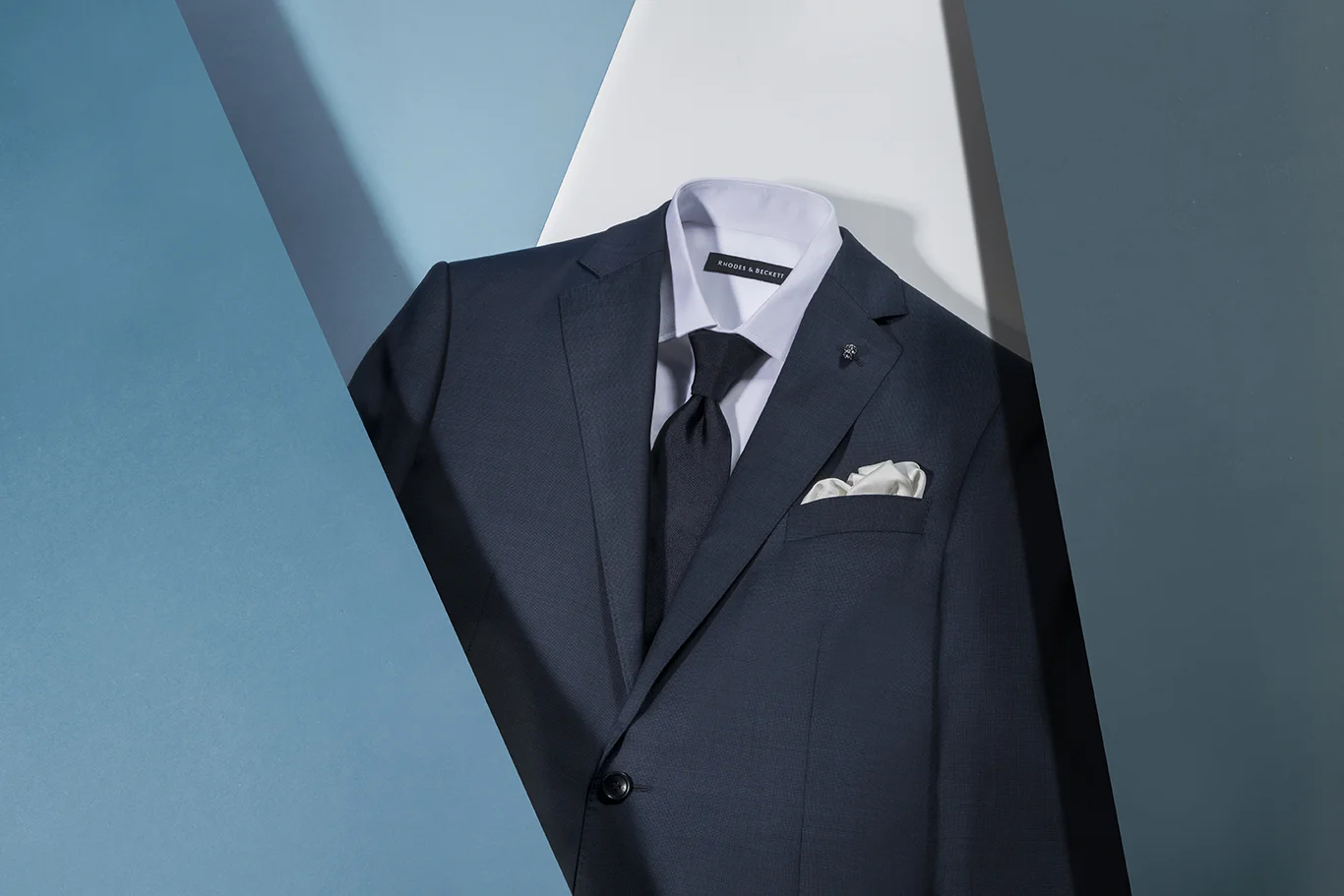 Navy End on end Suit_Navy Tie_Skull Pin_.jpg