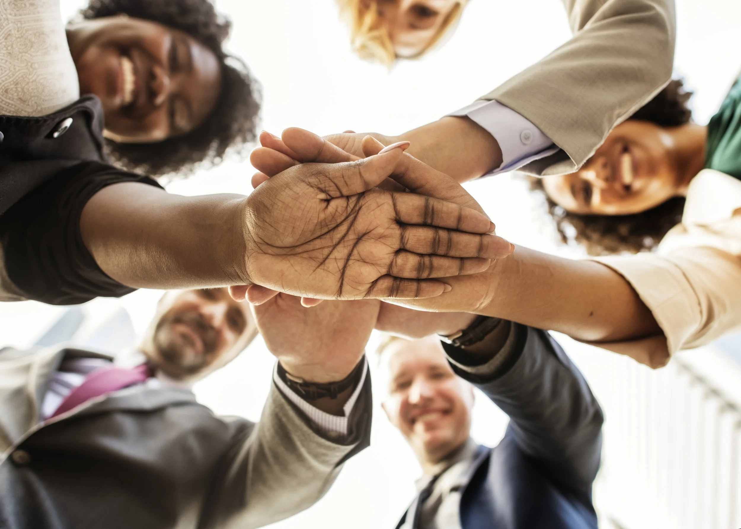 Huddle with hands.jpg