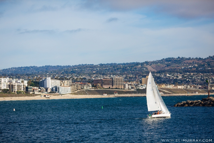 Sailboat in harbor at Redondo Beach, CA