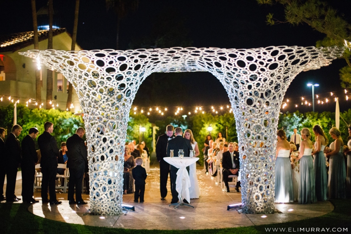 bride and groom at the alter