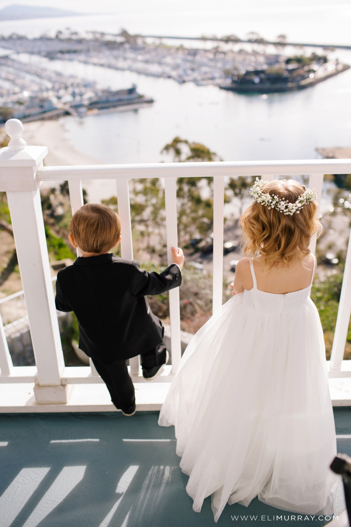 flower girl and ring bearer overlooking dana point harbor