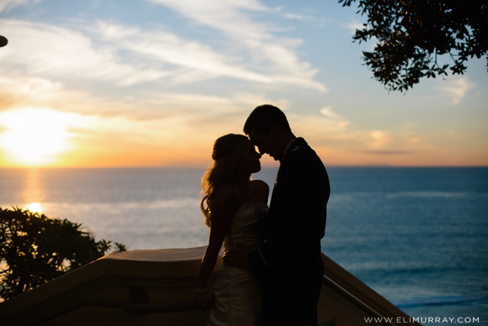 sunset photo of bride and groom at the ritz-carlton