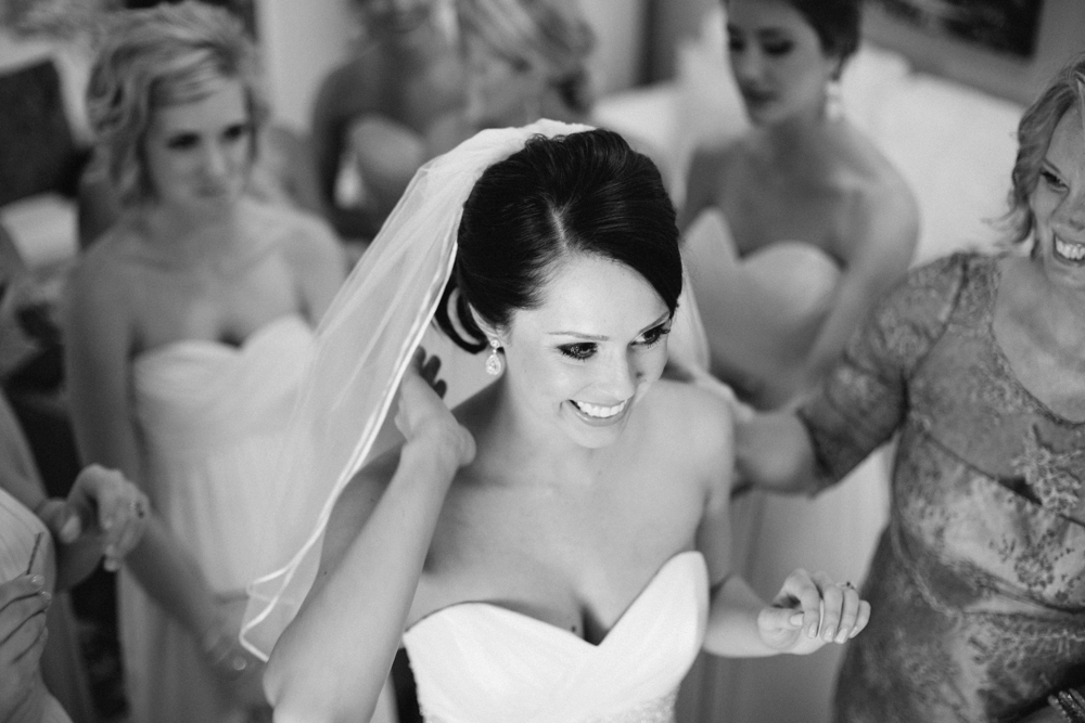 black and white portrait of bride getting ready
