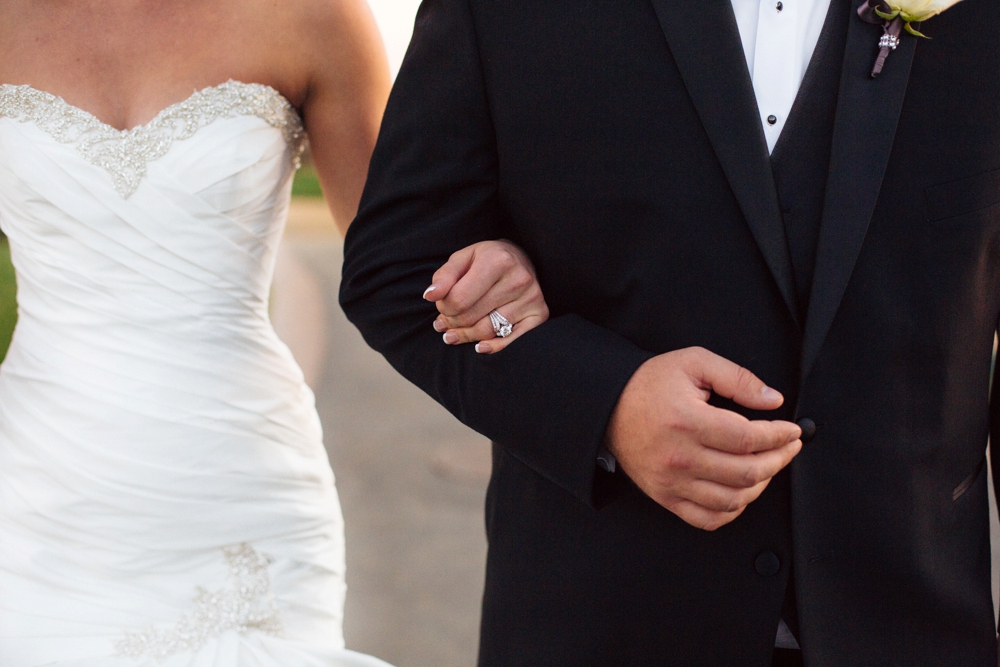 Bride and Groom arm in arm