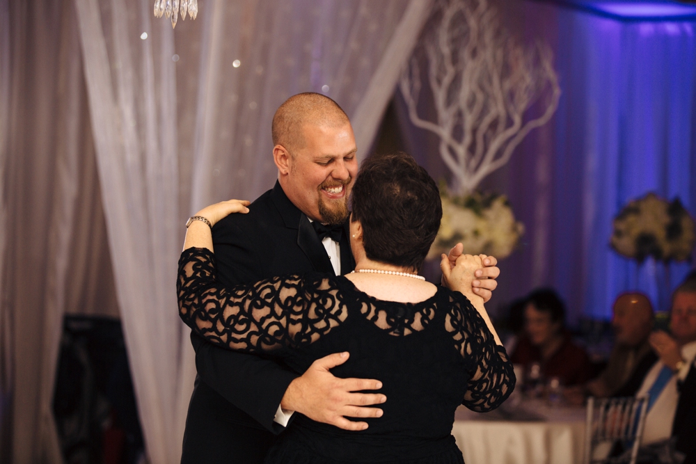 Groom dancing with mom