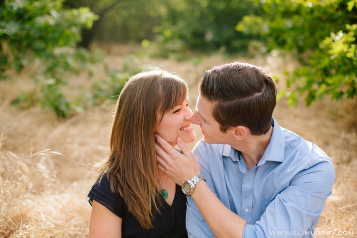 Intimate photo of couple in a field