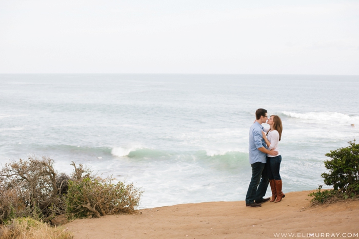 Couple on cliff in Laguna Beach