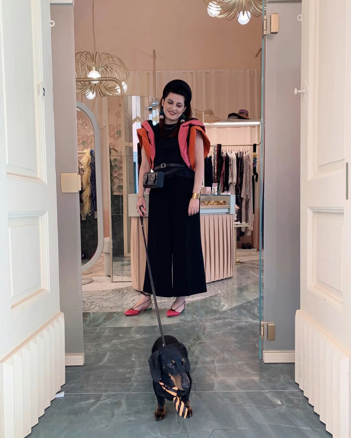 Marilla Avino with the ODP Bici Bag at the entrance of The Pink Closet