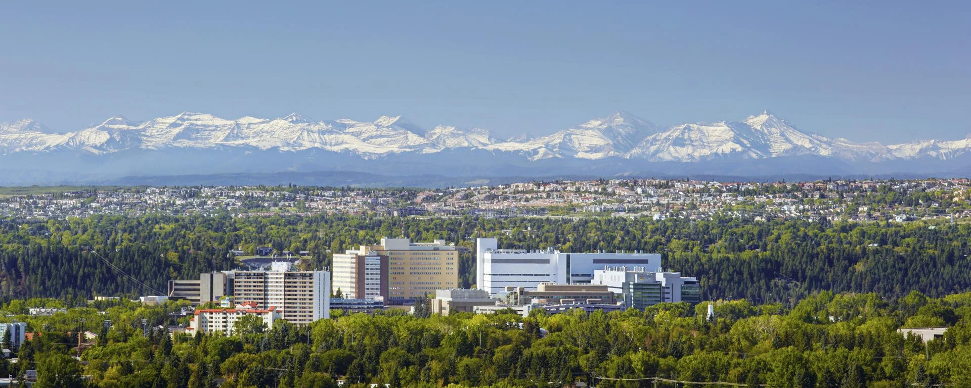 University of Calgary Foothills medical campus with the Rocky Mountains in the distance