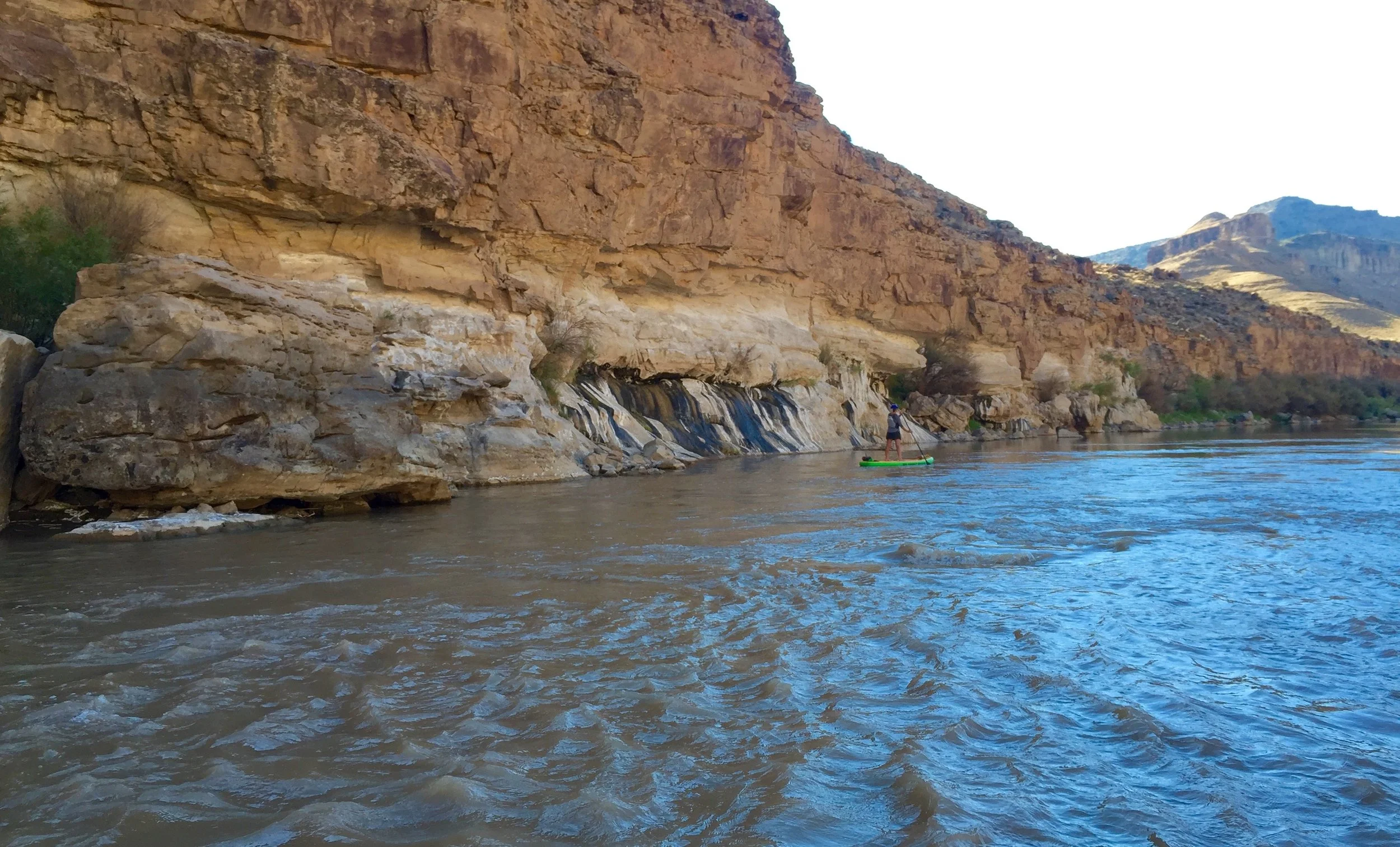 My wife paddling near the seeps in Lower Gray Canyon of the Green River. This area served as source material for Seep No. 3 (Another Pioneer) .